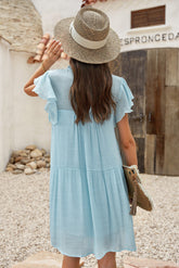 Robe à col volanté et manches flottantes